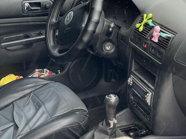 Фольксваген Гольф 2004 в Новой Ушице на Automoto.ua Серый Фольксваген Гольф, объемом двигателя 1.6 л и пробегом 202 тыс. км за 4500 $, фото 4 на Automoto.ua