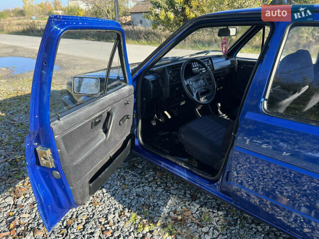 Синий Фольксваген Гольф, объемом двигателя 1.27 л и пробегом 300 тыс. км за 1550 $, фото 11 на Automoto.ua