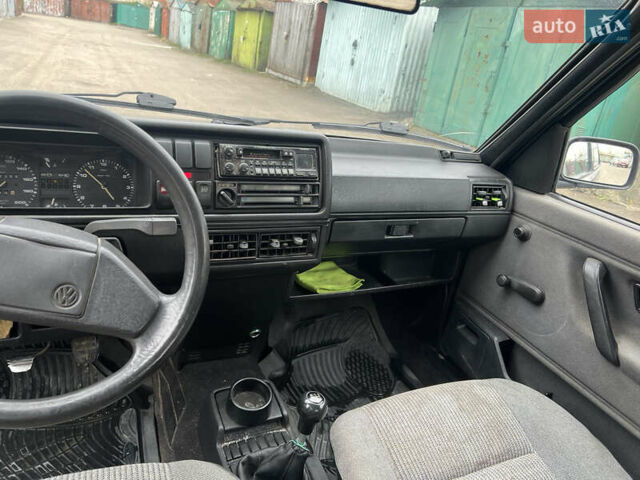 Синий Фольксваген Гольф, объемом двигателя 1.27 л и пробегом 313 тыс. км за 950 $, фото 12 на Automoto.ua