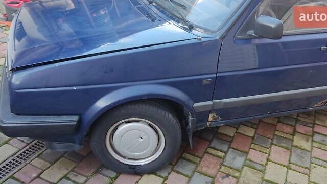 Синий Фольксваген Гольф, объемом двигателя 1.6 л и пробегом 399 тыс. км за 1200 $, фото 2 на Automoto.ua