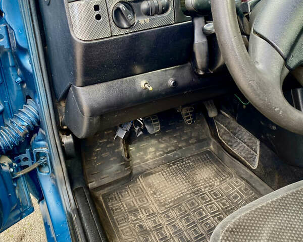 Синій Фольксваген Гольф, об'ємом двигуна 1.39 л та пробігом 150 тис. км за 2000 $, фото 6 на Automoto.ua