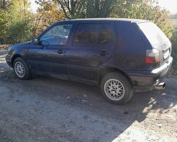 Синій Фольксваген Гольф, об'ємом двигуна 1.39 л та пробігом 270 тис. км за 2099 $, фото 4 на Automoto.ua