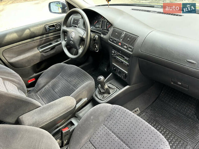 Синій Фольксваген Гольф, об'ємом двигуна 1.39 л та пробігом 218 тис. км за 3650 $, фото 18 на Automoto.ua