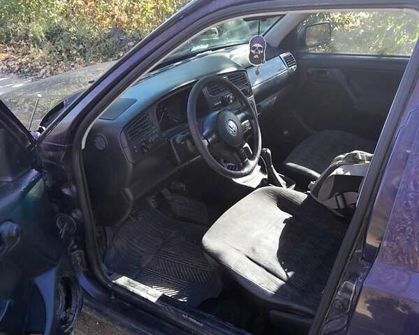 Синій Фольксваген Гольф, об'ємом двигуна 1.39 л та пробігом 270 тис. км за 2099 $, фото 19 на Automoto.ua