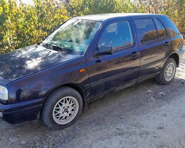 Синій Фольксваген Гольф, об'ємом двигуна 1.39 л та пробігом 270 тис. км за 2099 $, фото 5 на Automoto.ua