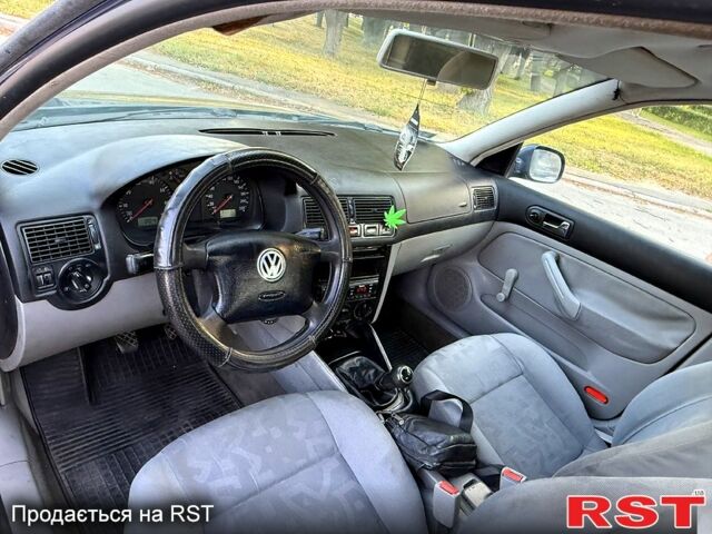 Синий Фольксваген Гольф, объемом двигателя 1.4 л и пробегом 310 тыс. км за 3550 $, фото 2 на Automoto.ua