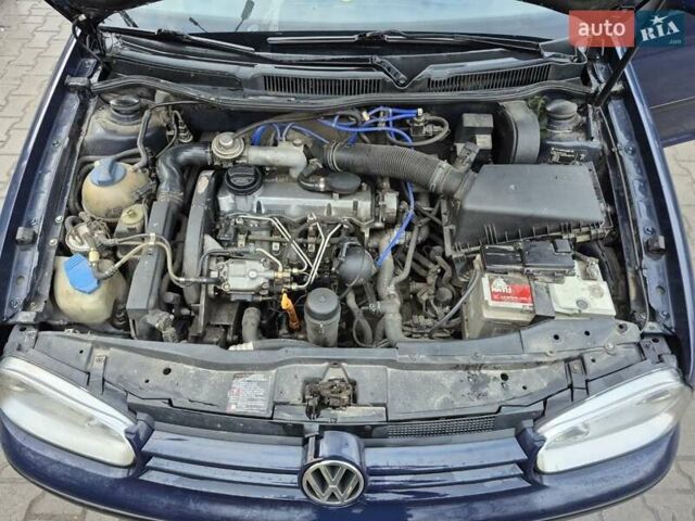 Синий Фольксваген Гольф, объемом двигателя 1.9 л и пробегом 318 тыс. км за 3499 $, фото 5 на Automoto.ua