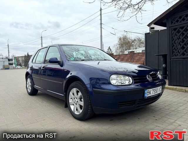 Синий Фольксваген Гольф, объемом двигателя 1.4 л и пробегом 246 тыс. км за 4200 $, фото 6 на Automoto.ua