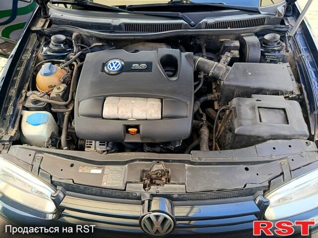 Синий Фольксваген Гольф, объемом двигателя 2 л и пробегом 233 тыс. км за 4600 $, фото 5 на Automoto.ua