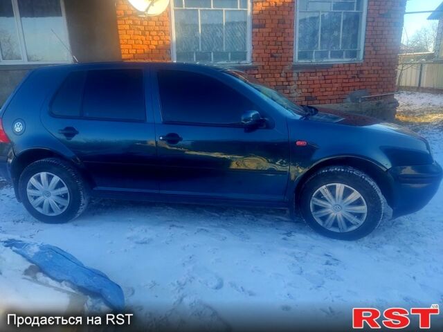 Синий Фольксваген Гольф, объемом двигателя 1.6 л и пробегом 365 тыс. км за 4000 $, фото 3 на Automoto.ua