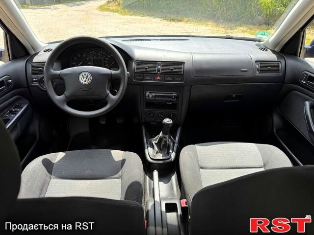 Синий Фольксваген Гольф, объемом двигателя 1.4 л и пробегом 267 тыс. км за 4599 $, фото 8 на Automoto.ua