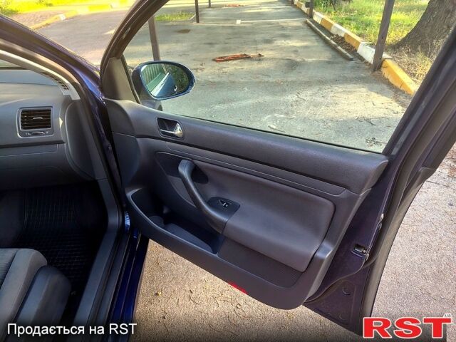 Синий Фольксваген Гольф, объемом двигателя 1.4 л и пробегом 312 тыс. км за 4800 $, фото 11 на Automoto.ua