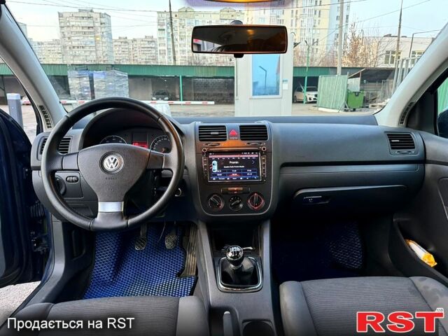 Синий Фольксваген Гольф, объемом двигателя 1.4 л и пробегом 289 тыс. км за 4450 $, фото 7 на Automoto.ua