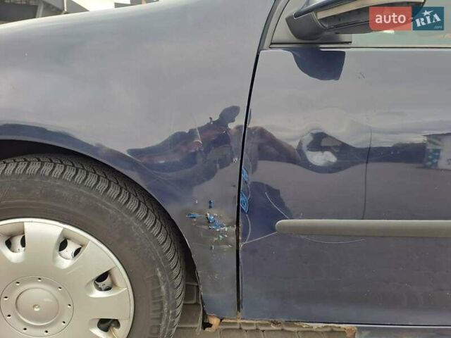 Синий Фольксваген Гольф, объемом двигателя 1.4 л и пробегом 430 тыс. км за 4100 $, фото 4 на Automoto.ua