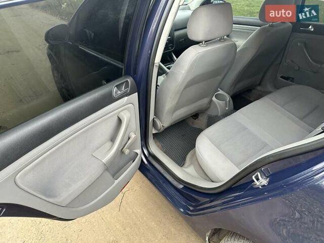 Синий Фольксваген Гольф, объемом двигателя 1.4 л и пробегом 268 тыс. км за 4450 $, фото 17 на Automoto.ua