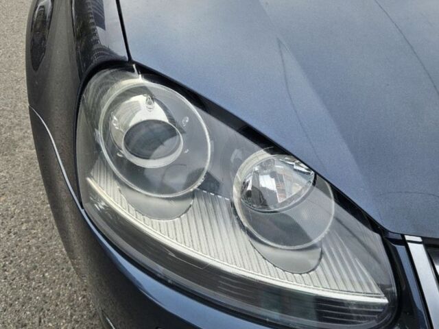 Синий Фольксваген Гольф, объемом двигателя 1.4 л и пробегом 225 тыс. км за 5950 $, фото 4 на Automoto.ua