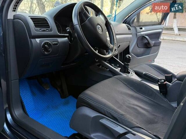 Синий Фольксваген Гольф, объемом двигателя 1.9 л и пробегом 238 тыс. км за 5800 $, фото 6 на Automoto.ua