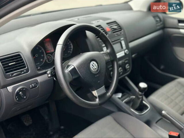 Синий Фольксваген Гольф, объемом двигателя 1.4 л и пробегом 210 тыс. км за 6600 $, фото 9 на Automoto.ua