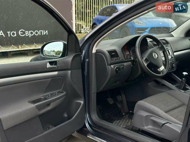 Синий Фольксваген Гольф, объемом двигателя 1.4 л и пробегом 210 тыс. км за 6600 $, фото 7 на Automoto.ua