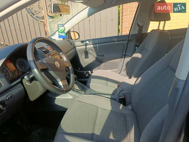 Фольксваген Гольф 2008 в Александрие на Automoto.ua Синий Фольксваген Гольф, объемом двигателя 0 л и пробегом 210 тыс. км за 6350 $, фото 5 на Automoto.ua