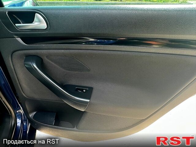 Синий Фольксваген Гольф, объемом двигателя 2 л и пробегом 207 тыс. км за 9950 $, фото 8 на Automoto.ua