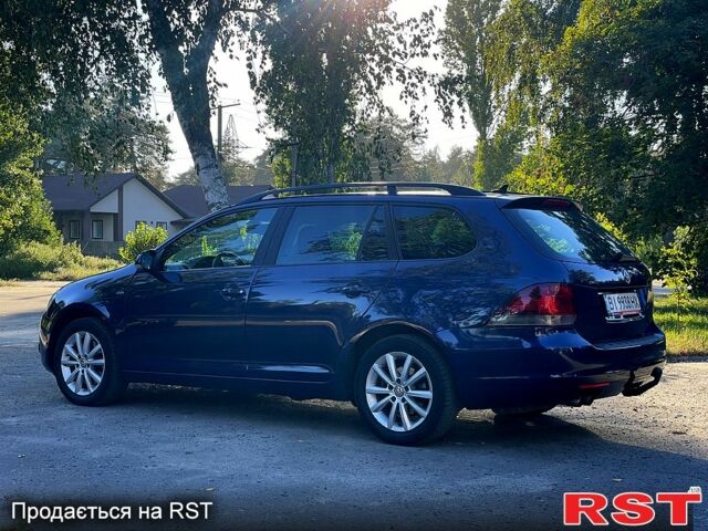 Синий Фольксваген Гольф, объемом двигателя 2 л и пробегом 210 тыс. км за 9400 $, фото 4 на Automoto.ua