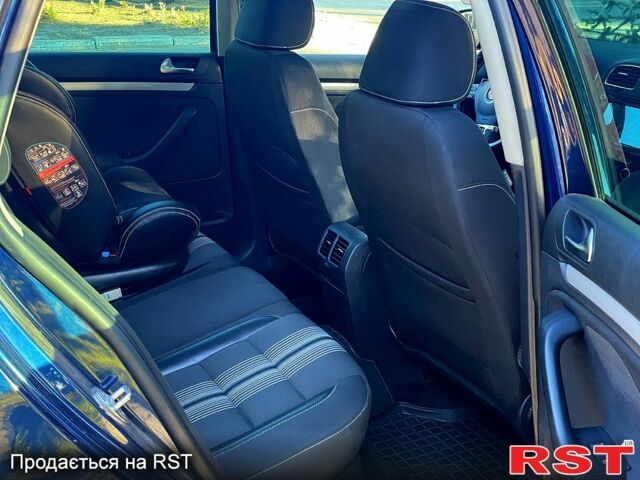 Синий Фольксваген Гольф, объемом двигателя 2 л и пробегом 210 тыс. км за 9400 $, фото 10 на Automoto.ua