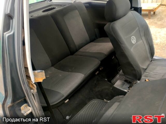 Зеленый Фольксваген Гольф, объемом двигателя 1.8 л и пробегом 164 тыс. км за 1399 $, фото 6 на Automoto.ua