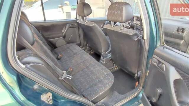 Зеленый Фольксваген Гольф, объемом двигателя 1.39 л и пробегом 245 тыс. км за 2290 $, фото 3 на Automoto.ua