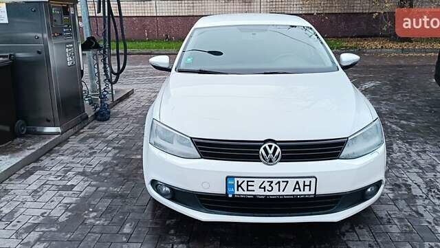 Білий Фольксваген Джетта, об'ємом двигуна 1.39 л та пробігом 261 тис. км за 9300 $, фото 4 на Automoto.ua