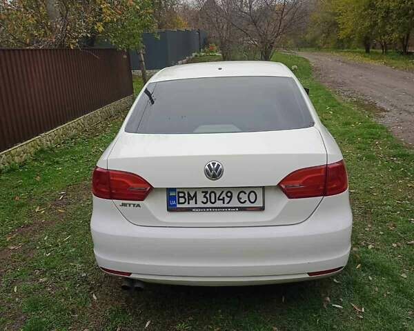 Фольксваген Джетта 2012 у Ромнах на Automoto.ua Білий Фольксваген Джетта, об'ємом двигуна 1.98 л та пробігом 262 тис. км за 7500 $, фото 4 на Automoto.ua