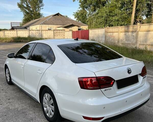 Білий Фольксваген Джетта, об'ємом двигуна 1.39 л та пробігом 128 тис. км за 9400 $, фото 4 на Automoto.ua