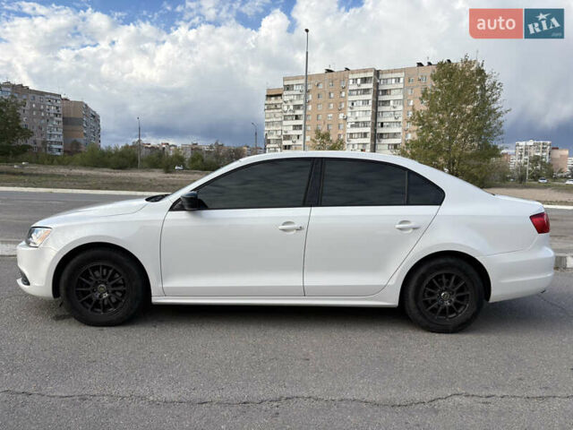 Фольксваген Джетта 2013 в Запорожье на Automoto.ua Белый Фольксваген Джетта, объемом двигателя 1.98 л и пробегом 169 тыс. км за 8000 $, фото 5 на Automoto.ua