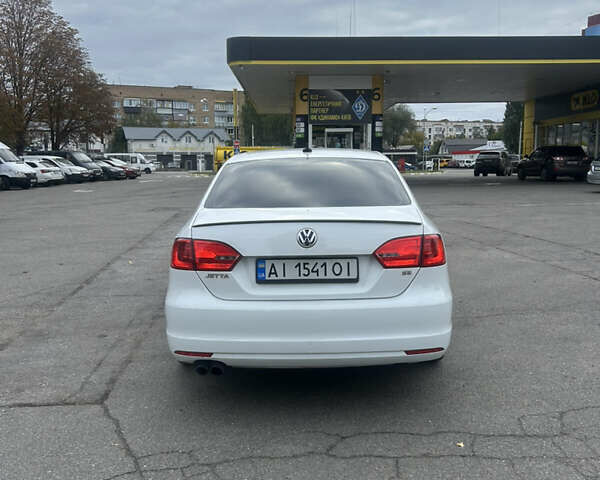 Фольксваген Джетта 2014 в Василькове на Automoto.ua Белый Фольксваген Джетта, объемом двигателя 1.8 л и пробегом 198 тыс. км за 10500 $, фото 2 на Automoto.ua