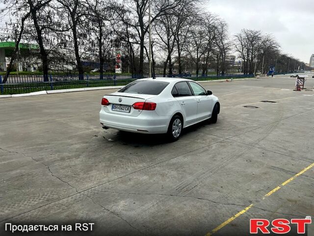 Білий Фольксваген Джетта, об'ємом двигуна 2 л та пробігом 145 тис. км за 8888 $, фото 6 на Automoto.ua