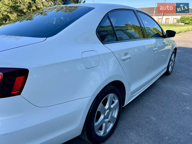 Белый Фольксваген Джетта, объемом двигателя 1.4 л и пробегом 195 тыс. км за 9000 $, фото 24 на Automoto.ua