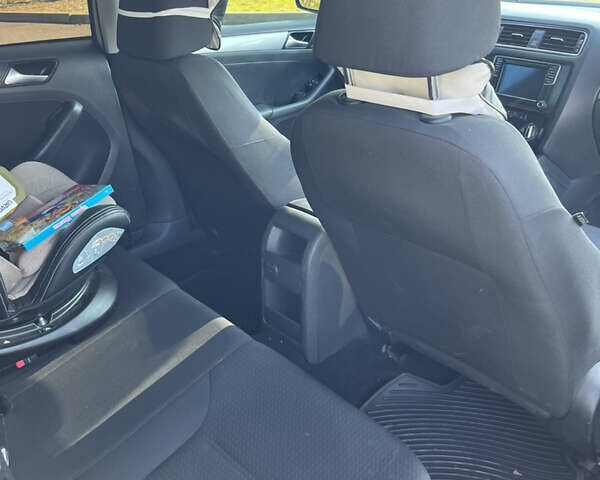 Белый Фольксваген Джетта, объемом двигателя 1.39 л и пробегом 174 тыс. км за 9100 $, фото 12 на Automoto.ua