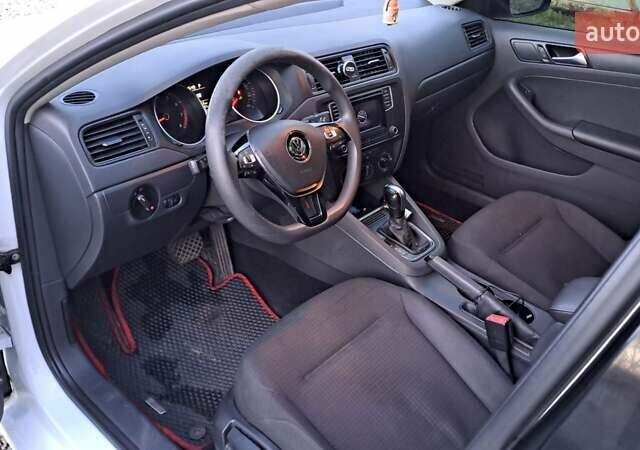 Білий Фольксваген Джетта, об'ємом двигуна 1.39 л та пробігом 197 тис. км за 9400 $, фото 8 на Automoto.ua