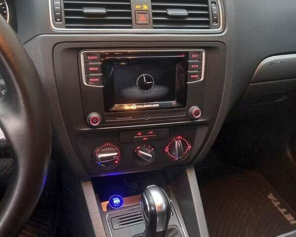Білий Фольксваген Джетта, об'ємом двигуна 1.4 л та пробігом 98 тис. км за 9799 $, фото 11 на Automoto.ua