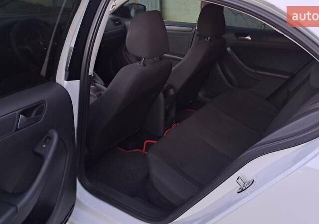 Білий Фольксваген Джетта, об'ємом двигуна 1.39 л та пробігом 197 тис. км за 9400 $, фото 10 на Automoto.ua