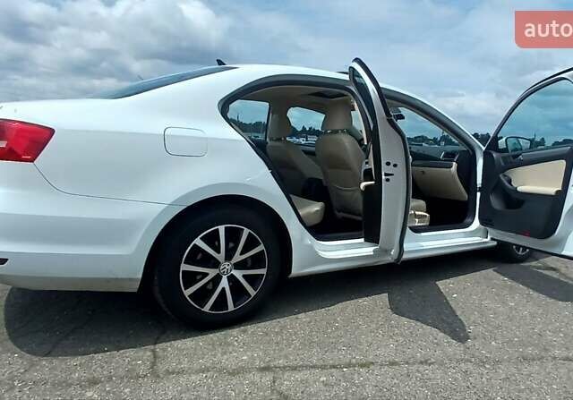 Белый Фольксваген Джетта, объемом двигателя 1.4 л и пробегом 156 тыс. км за 10499 $, фото 5 на Automoto.ua