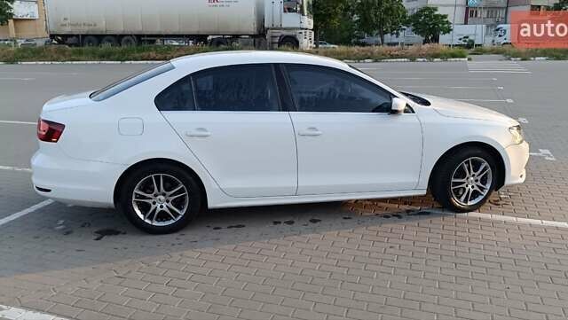 Білий Фольксваген Джетта, об'ємом двигуна 1.4 л та пробігом 100 тис. км за 11500 $, фото 2 на Automoto.ua