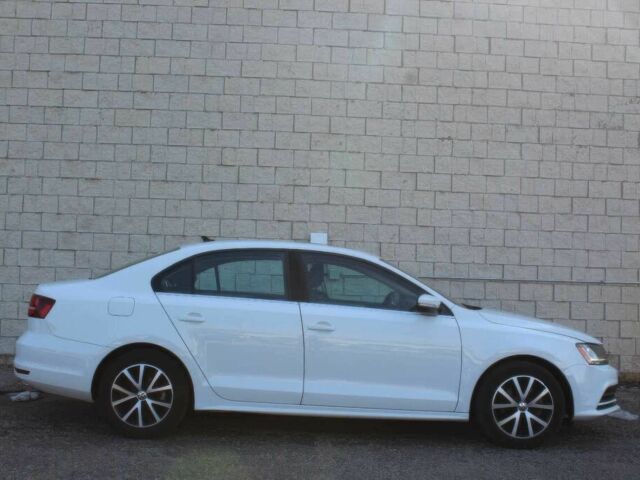 Белый Фольксваген Джетта, объемом двигателя 1.4 л и пробегом 56 тыс. км за 3100 $, фото 5 на Automoto.ua