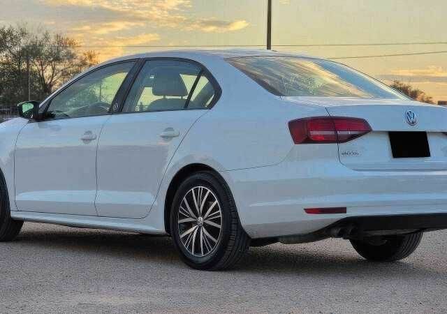 Белый Фольксваген Джетта, объемом двигателя 1.4 л и пробегом 88 тыс. км за 7900 $, фото 6 на Automoto.ua