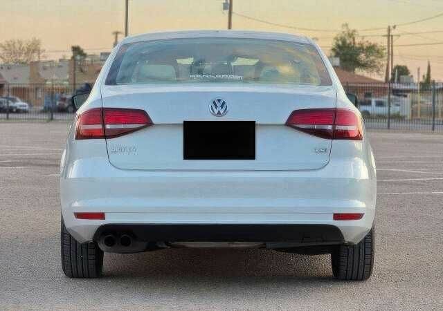 Белый Фольксваген Джетта, объемом двигателя 1.4 л и пробегом 88 тыс. км за 7900 $, фото 5 на Automoto.ua