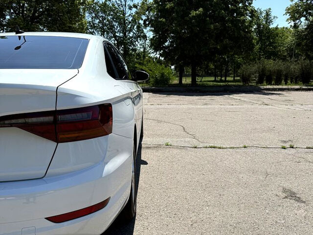 Белый Фольксваген Джетта, объемом двигателя 1.4 л и пробегом 130 тыс. км за 12800 $, фото 7 на Automoto.ua