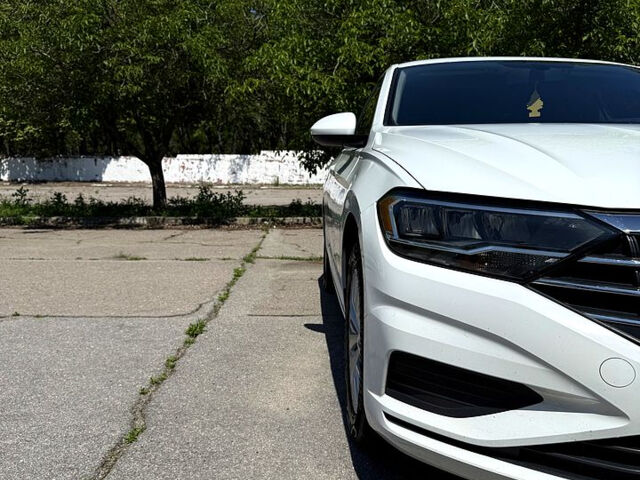 Белый Фольксваген Джетта, объемом двигателя 1.4 л и пробегом 130 тыс. км за 12800 $, фото 3 на Automoto.ua