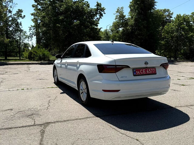 Белый Фольксваген Джетта, объемом двигателя 1.4 л и пробегом 130 тыс. км за 12800 $, фото 5 на Automoto.ua