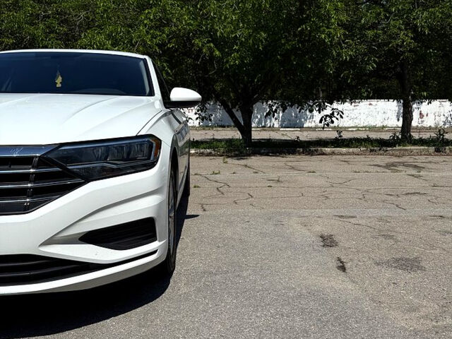 Белый Фольксваген Джетта, объемом двигателя 1.4 л и пробегом 130 тыс. км за 12800 $, фото 4 на Automoto.ua