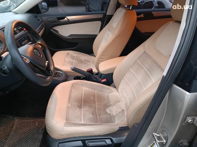 Бежевий Фольксваген Джетта, об'ємом двигуна 1.8 л та пробігом 163 тис. км за 9990 $, фото 18 на Automoto.ua